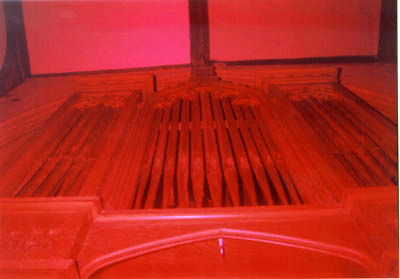 Church organ pipes with red flash